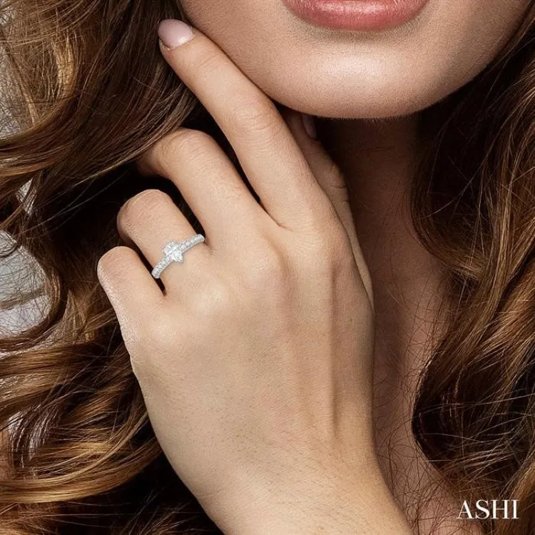 1 1/10 Ctw Pear Shape Diamond Ladies Engagement Ring with 5/8 Ct Pear Cut Center Stone in 14K White Gold