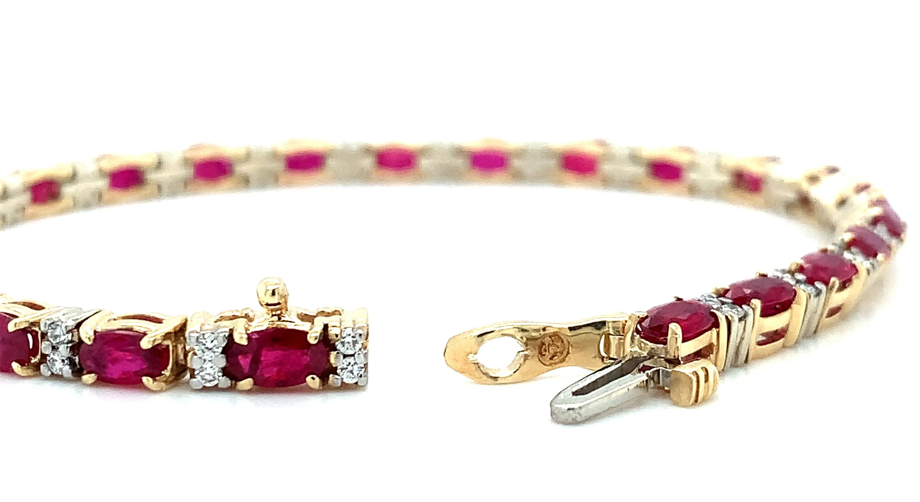 6.27 Carat Total Ruby and Diamond, Yellow and White Gold Tennis Bracelet