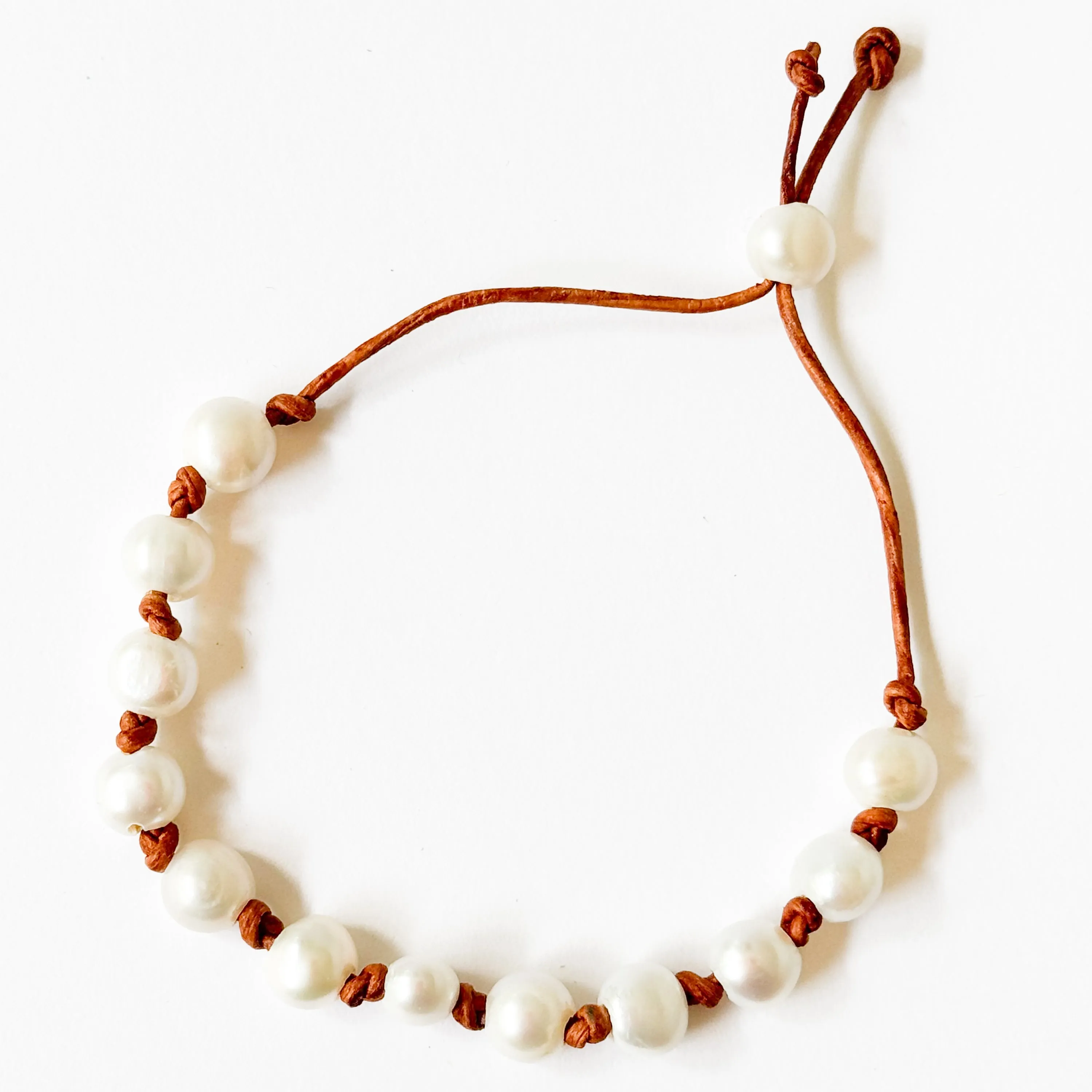 Adjustable Pearl and Leather Cord Bracelet