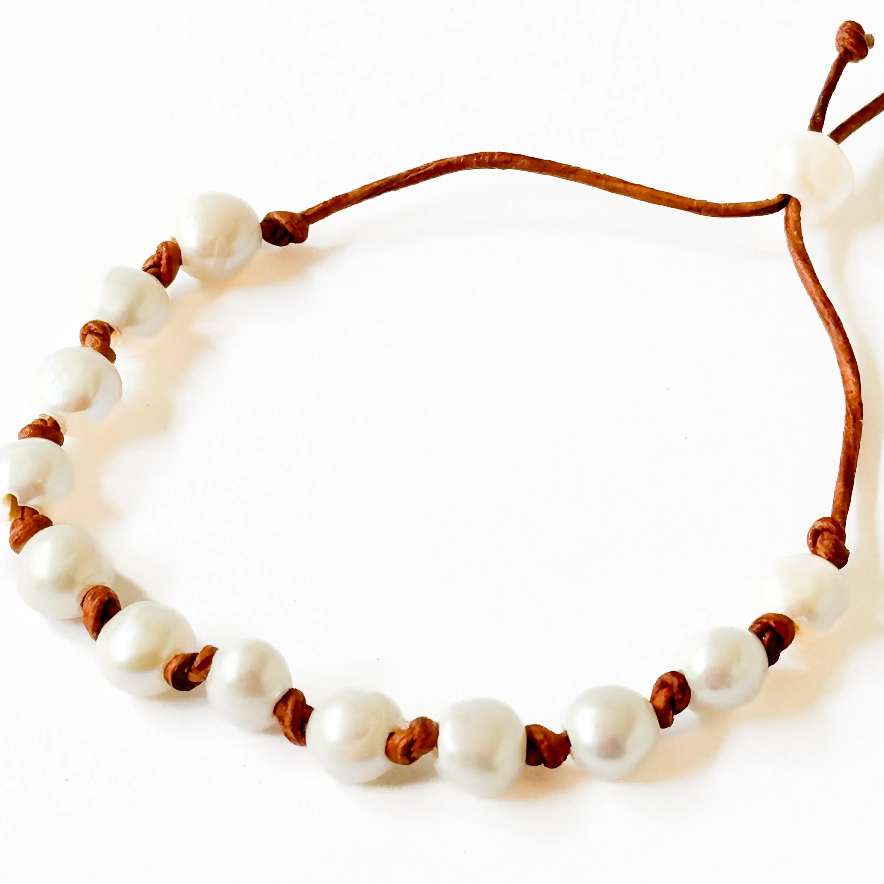 Adjustable Pearl and Leather Cord Bracelet