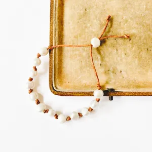 Adjustable Pearl and Leather Cord Bracelet