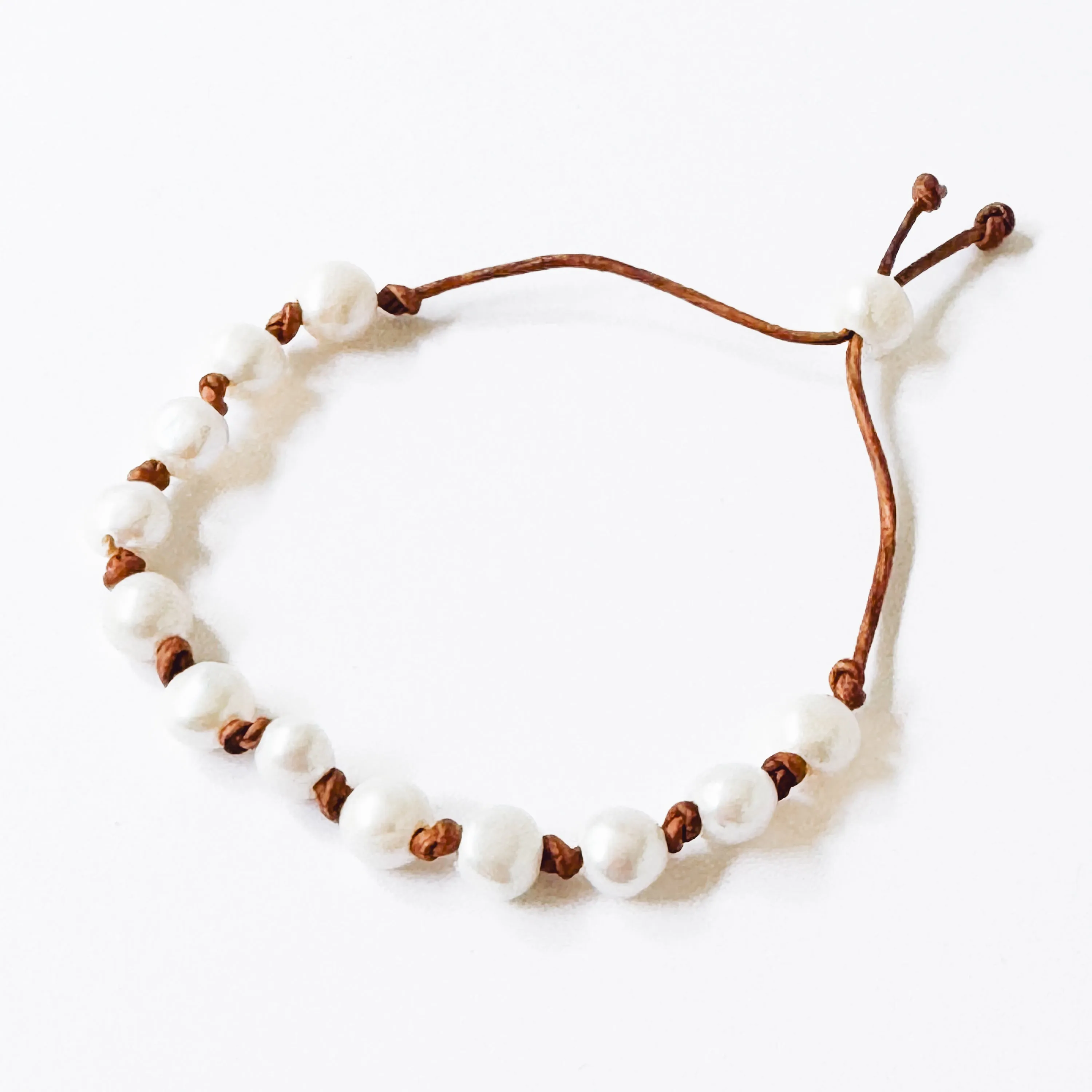 Adjustable Pearl and Leather Cord Bracelet