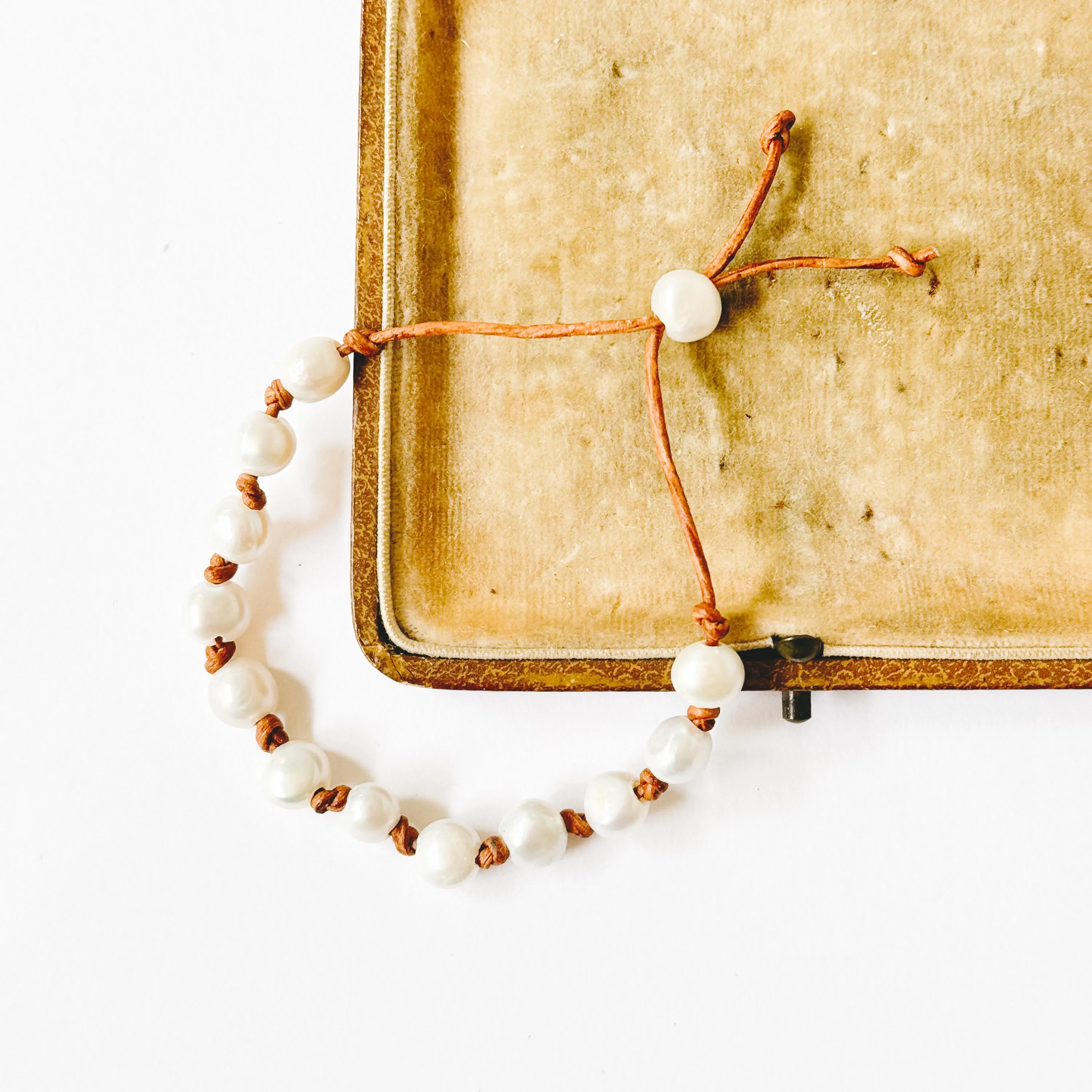 Adjustable Pearl and Leather Cord Bracelet