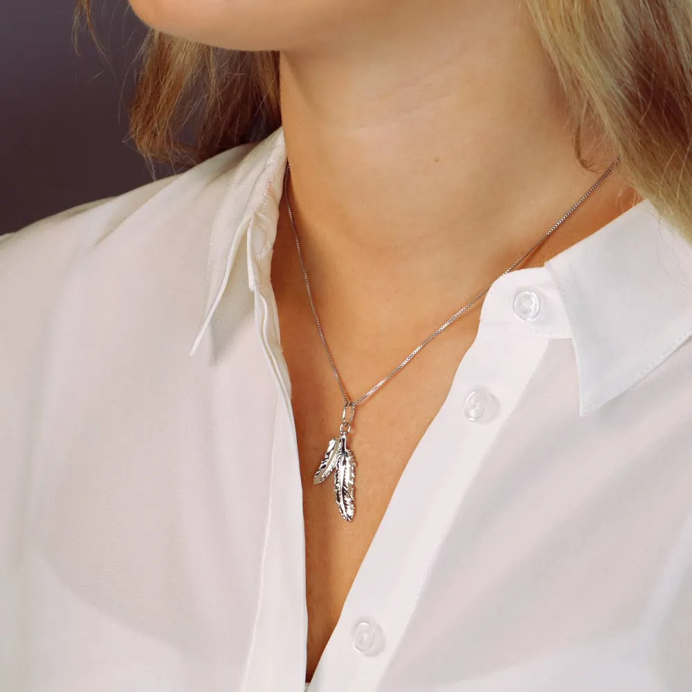 Curving Double Feather Pendant