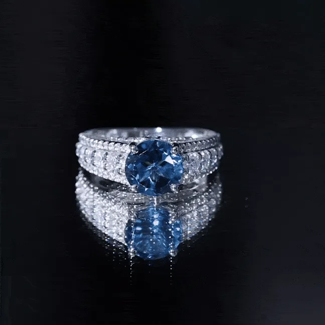 London Blue Topaz and Moissanite Statement Engagement Ring