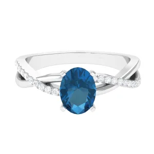 London Blue Topaz Crossover Engagement Ring with Diamond Side Stone