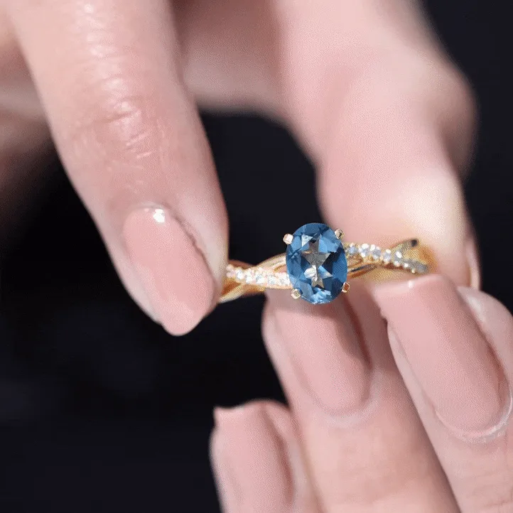 London Blue Topaz Crossover Engagement Ring with Diamond Side Stone