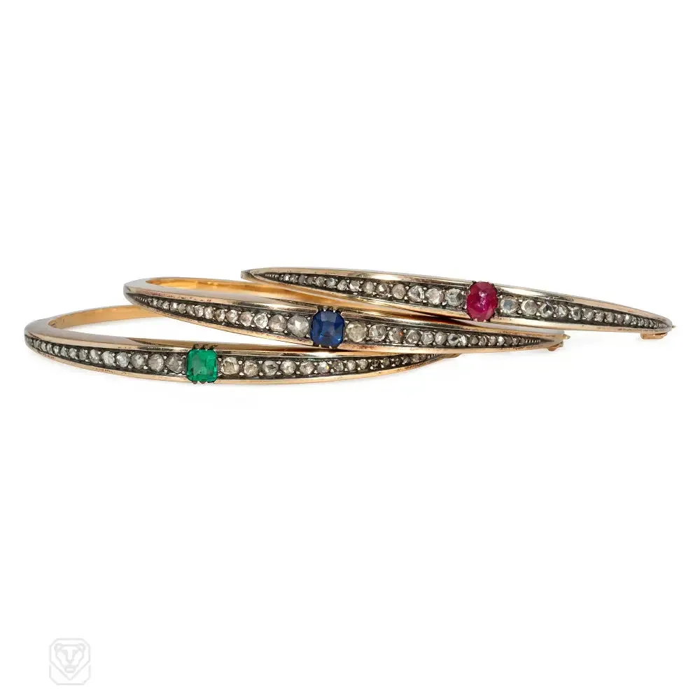 Three antique French diamond, gold, and gem-set bangles
