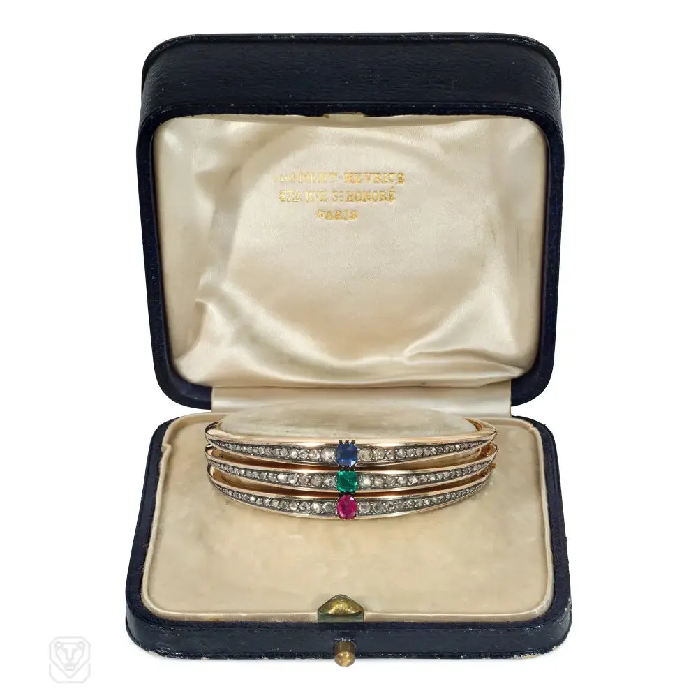 Three antique French diamond, gold, and gem-set bangles