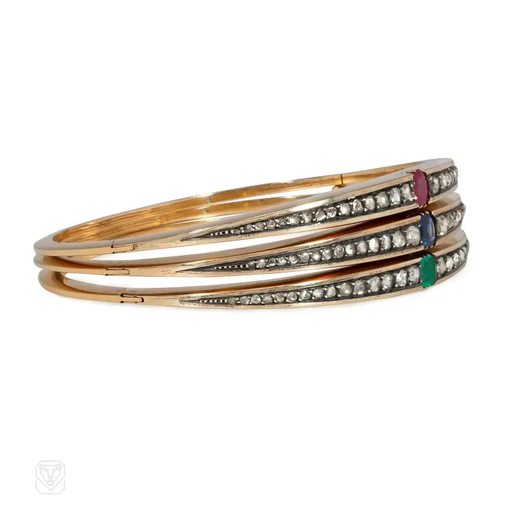 Three antique French diamond, gold, and gem-set bangles