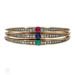 Three antique French diamond, gold, and gem-set bangles